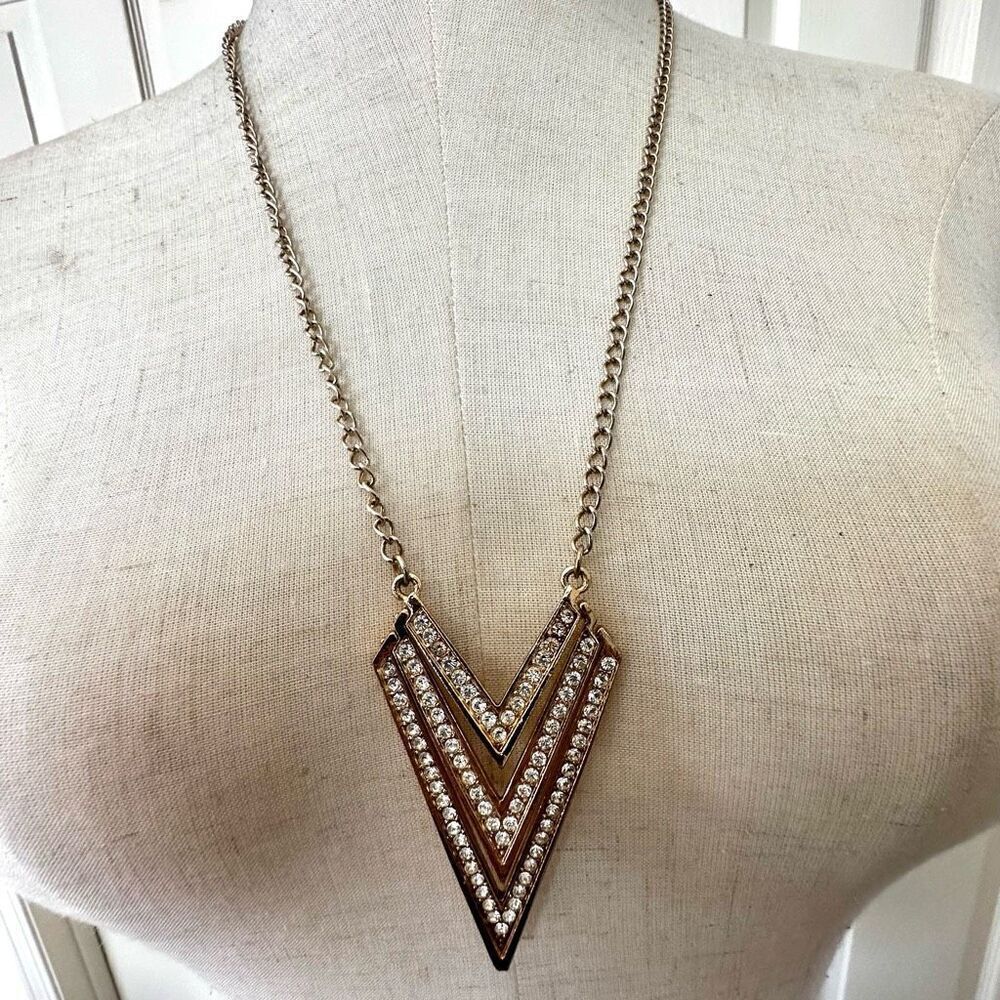 Gold tone rhinestone chevron pendant necklace